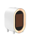 Small white and gold heater on a white background