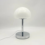 White table lamp with a chrome base on a white background