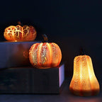 Decorative pumpkins with a textured surface on a dark background