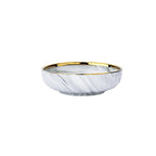 Marble-patterned saucer with gold rim and measurements on a white background
