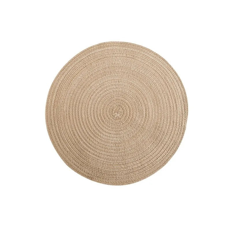 Round woven placemat on a white background